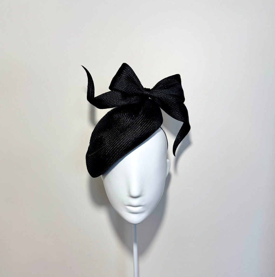 The balanced black bow