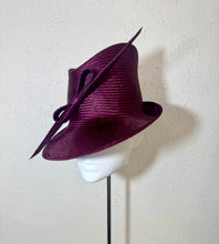 Sharp fedora with sharp bow