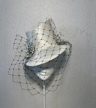 Sharp fedora in ivory