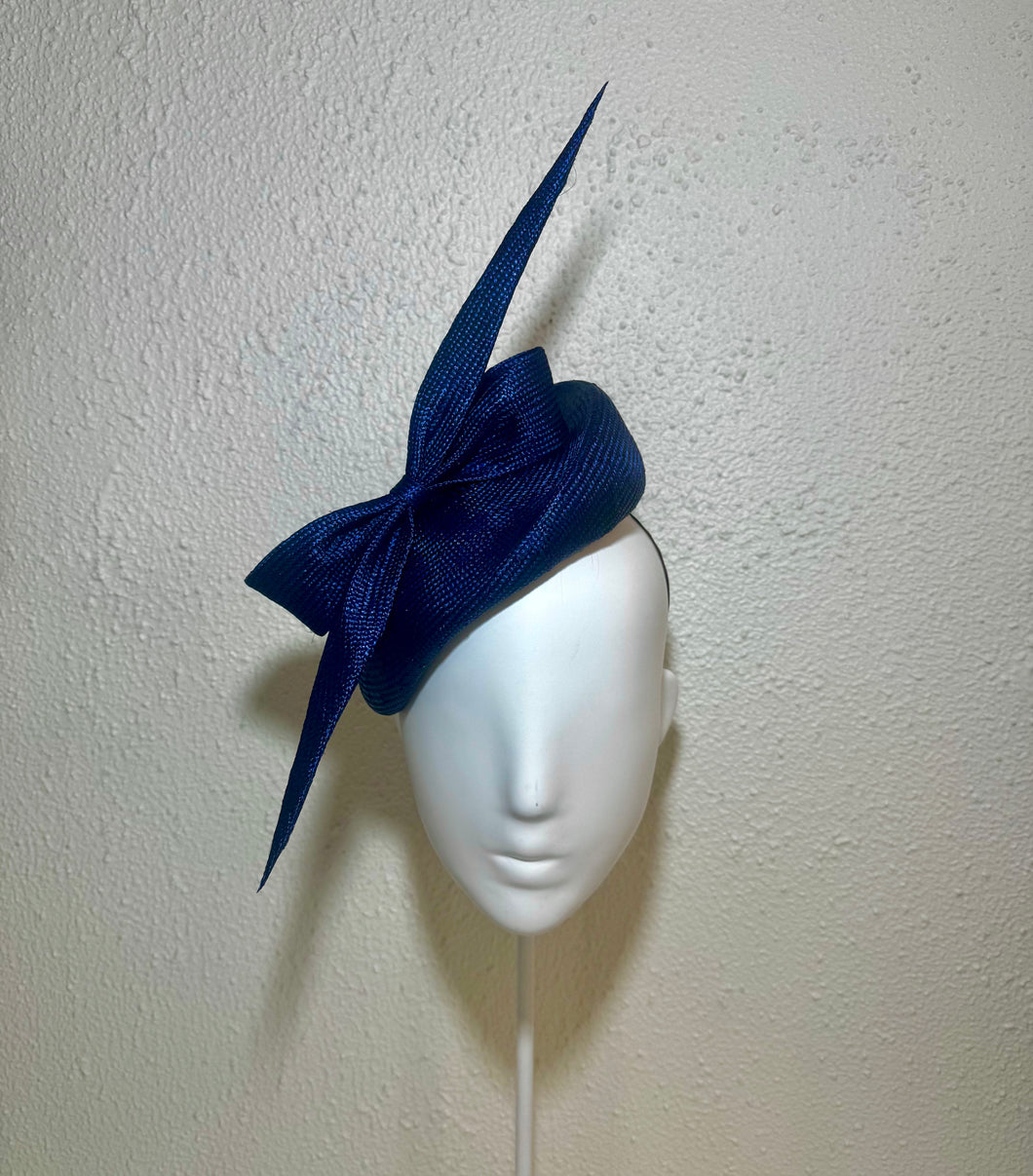 Sharp bow blue beret