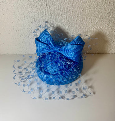Pork pie in cornflower with vintage veil and bow