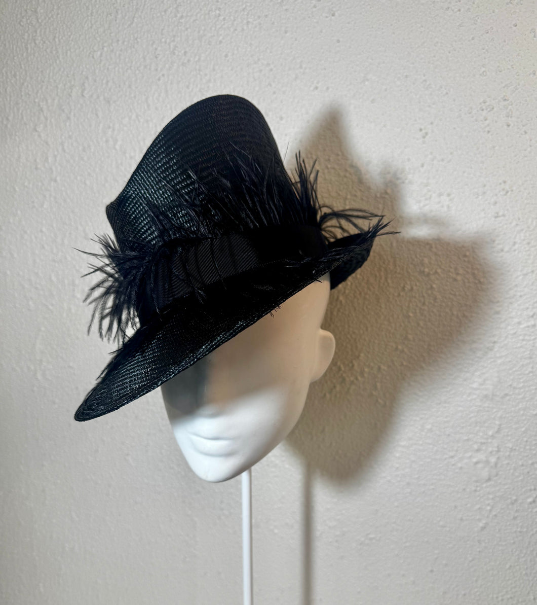 Feathered sharp fedora