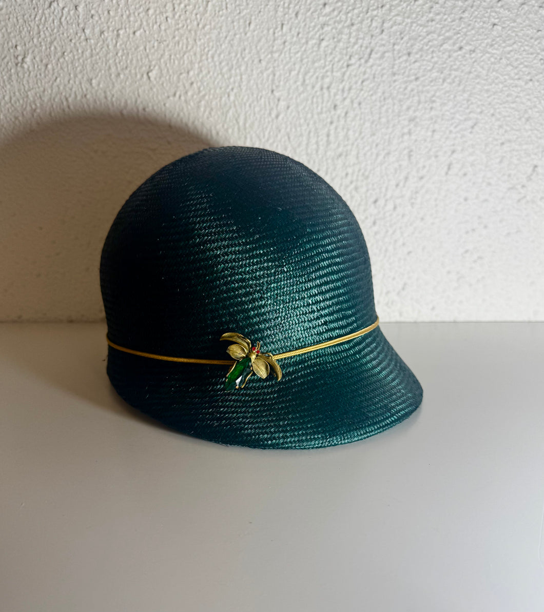 Bug on the jockey cap