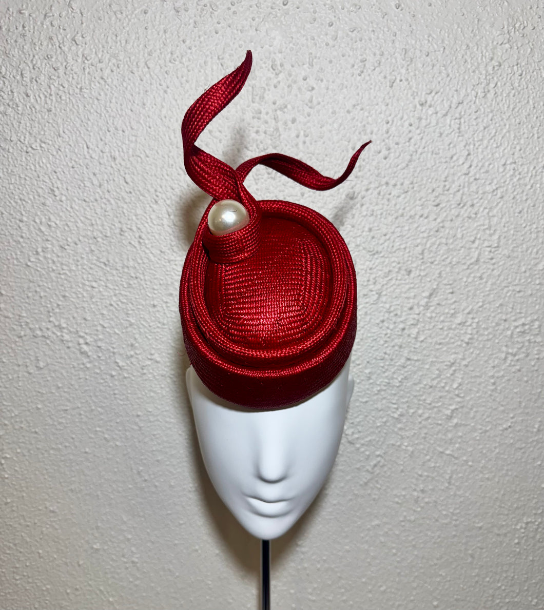 Pork pie red with oversized pearl
