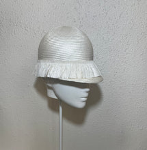 Ivory jockey cap with raffia wrap