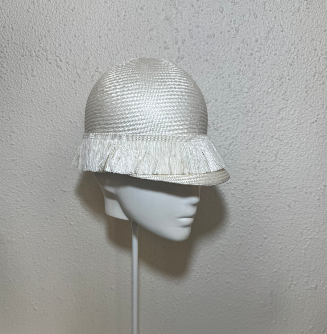 Ivory jockey cap with raffia wrap